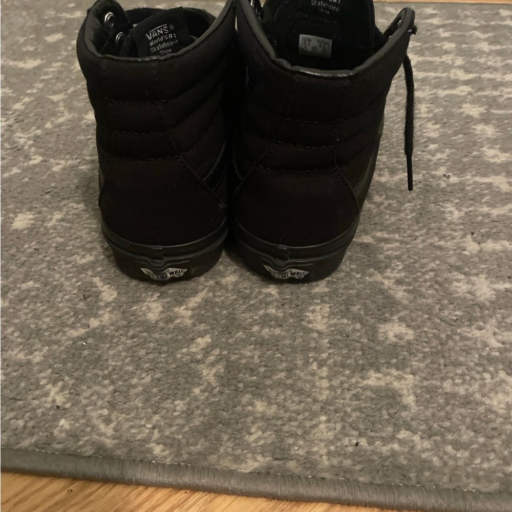 Used Vans black hightop sneakers
